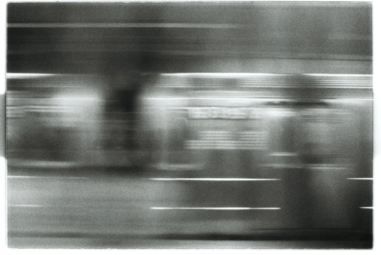 Motion blur of a subway train, reflecting the pace and repetition of modern life. Film Photography by Percy Lin, 2017
